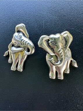 Vintage Avon silver-tone moving elephant  pierced earrings
